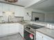 Modern kitchen with stainless steel appliances and ample counter space at 1843 Oregon Ne Ave, St Petersburg, FL 33703