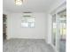 Versatile bonus room with sliding glass doors to backyard at 1843 Oregon Ne Ave, St Petersburg, FL 33703