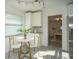 Eat-in kitchen with white cabinetry and marble-top table at 1843 Oregon Ne Ave, St Petersburg, FL 33703