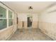 Dining room with new flooring and exposed walls at 1843 Oregon Ne Ave, St Petersburg, FL 33703
