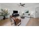 Bright and airy living room with comfortable seating and large TV at 25151 Geddy Dr, Land O Lakes, FL 34639