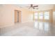 Living room featuring tile floors and ceiling fan at 2675 Firestone Dr, Clearwater, FL 33761