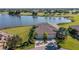 Property is situated on a lake with golf course views at 1105 Wellington Greens Cir # 1105, Sun City Center, FL 33573