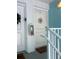 Condo entryway with white door and nautical wreath at 3730 42Nd S Way # H, St Petersburg, FL 33711