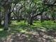 Peaceful common area with mature trees and picnic table at 3730 42Nd S Way # H, St Petersburg, FL 33711
