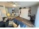 Bright living room with comfy sofas, wood floors, and coastal decor at 3730 42Nd S Way # H, St Petersburg, FL 33711