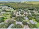 Aerial view of community near water and conservation area at 2102 Hailstone Cir, Sun City Center, FL 33573