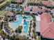 Resort-style pool with spacious deck and lounge areas at 16850 Whisper Elm St, Wimauma, FL 33598
