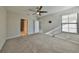 Bright bedroom with ceiling fan and window coverings at 16850 Whisper Elm St, Wimauma, FL 33598