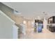 Modern kitchen with dark cabinetry and an island at 16850 Whisper Elm St, Wimauma, FL 33598