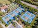 Well-maintained pickleball courts with ample parking at 16850 Whisper Elm St, Wimauma, FL 33598