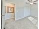 Comfortable bedroom with ceiling fan and double closet at 16850 Whisper Elm St, Wimauma, FL 33598