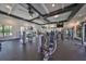 State-of-the-art fitness center with various exercise equipment at 16850 Whisper Elm St, Wimauma, FL 33598