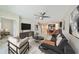 Open-concept living area with modern decor at 16850 Whisper Elm St, Wimauma, FL 33598