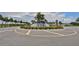 Beautiful community entrance with a centerpiece fountain at 16850 Whisper Elm St, Wimauma, FL 33598