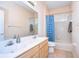 Bathroom with double vanity and shower/tub combo at 3107 Red Lion Dr, Valrico, FL 33596