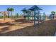 playground with two playsets, shade structures, and wood chips at 6258 Broad Field Ave, Apollo Beach, FL 33572