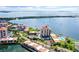 Aerial view of waterfront condo building with pool and parking at 6291 Bahia Del Mar Cir # 103, St Petersburg, FL 33715