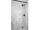Clean shower with marble tile and black fixtures at 6291 Bahia Del Mar Cir # 103, St Petersburg, FL 33715