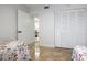 Bright bedroom with tiled floors and large closet at 6291 Bahia Del Mar Cir # 103, St Petersburg, FL 33715