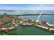 Aerial view highlighting a waterfront condo building and surrounding area at 6291 Bahia Del Mar Cir # 103, St Petersburg, FL 33715