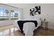 Bedroom with water view and modern decor at 6291 Bahia Del Mar Cir # 103, St Petersburg, FL 33715