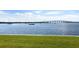 Scenic waterfront view with boats and bridge in distance at 6291 Bahia Del Mar Cir # 103, St Petersburg, FL 33715