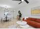 Bright living room features stylish furniture and access to dining area at 6291 Bahia Del Mar Cir # 103, St Petersburg, FL 33715