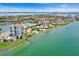 Aerial view of waterfront community with lush landscaping and water access at 6291 Bahia Del Mar Cir # 103, St Petersburg, FL 33715