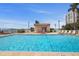 Inviting community pool with lounge chairs and cabana at 6291 Bahia Del Mar Cir # 103, St Petersburg, FL 33715