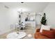Open concept living and dining area with modern decor at 6291 Bahia Del Mar Cir # 103, St Petersburg, FL 33715