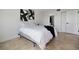Bedroom with modern decor and ensuite bathroom at 6291 Bahia Del Mar Cir # 103, St Petersburg, FL 33715
