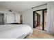 Bedroom with patio access and modern decor at 6291 Bahia Del Mar Cir # 103, St Petersburg, FL 33715