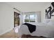 Bright bedroom with water view and patio access at 6291 Bahia Del Mar Cir # 103, St Petersburg, FL 33715