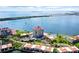 Aerial view of waterfront property showing building, pool, and boat access at 6291 Bahia Del Mar Cir # 103, St Petersburg, FL 33715