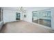 Bright screened porch overlooking the backyard at 1001 Chinaberry Rd, Clearwater, FL 33764