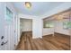 Bright entryway with hardwood floors, showing access to living areas at 1001 Chinaberry Rd, Clearwater, FL 33764