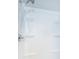 White shower with multiple shelves at 1001 Chinaberry Rd, Clearwater, FL 33764