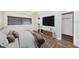 Main bedroom with a large window, wood-look floors, and a walk-in closet at 1001 Chinaberry Rd, Clearwater, FL 33764