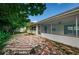 Brick patio and lush landscaping in backyard at 1001 Chinaberry Rd, Clearwater, FL 33764