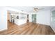 Modern kitchen with white cabinets, stainless steel appliances, and an island at 1001 Chinaberry Rd, Clearwater, FL 33764