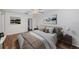 Main bedroom with a queen-size bed and ensuite bathroom access at 1001 Chinaberry Rd, Clearwater, FL 33764