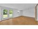 Bright room with double doors leading to the outdoors and tile flooring at 233 W College Ave, Ruskin, FL 33570