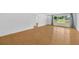 Open-concept living area with sleek floors and bright, airy atmosphere at 233 W College Ave, Ruskin, FL 33570