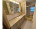 Bathroom featuring a vanity with mirror and a shower with a curtain at 2331 Belleair Rd # Lot 237, Clearwater, FL 33764
