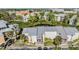 Condos overlook a pond, lush landscaping, and assigned parking at 621 99Th N Ave # 102, St Petersburg, FL 33702