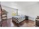 Bedroom with hardwood floors, a window for natural light, and minimalist decor at 621 99Th N Ave # 102, St Petersburg, FL 33702