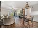 Spacious living room and dining area with hardwood floors and modern decor at 621 99Th N Ave # 102, St Petersburg, FL 33702