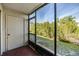 Screened patio overlooking lush greenery and outdoor space at 621 99Th N Ave # 102, St Petersburg, FL 33702