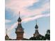 Architectural detail of ornate towers against a blue sky at 111 S Ashley Dr # 3205, Tampa, FL 33602